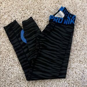 Nike Kids Black and Blue Striped Leggings